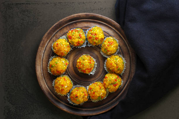 Laddu also know as laddoo, ladoo, laddo are ball-shaped sweets popular in the Indian festivals. Laddu are made of flour, minced dough and sugar with other ingredients.